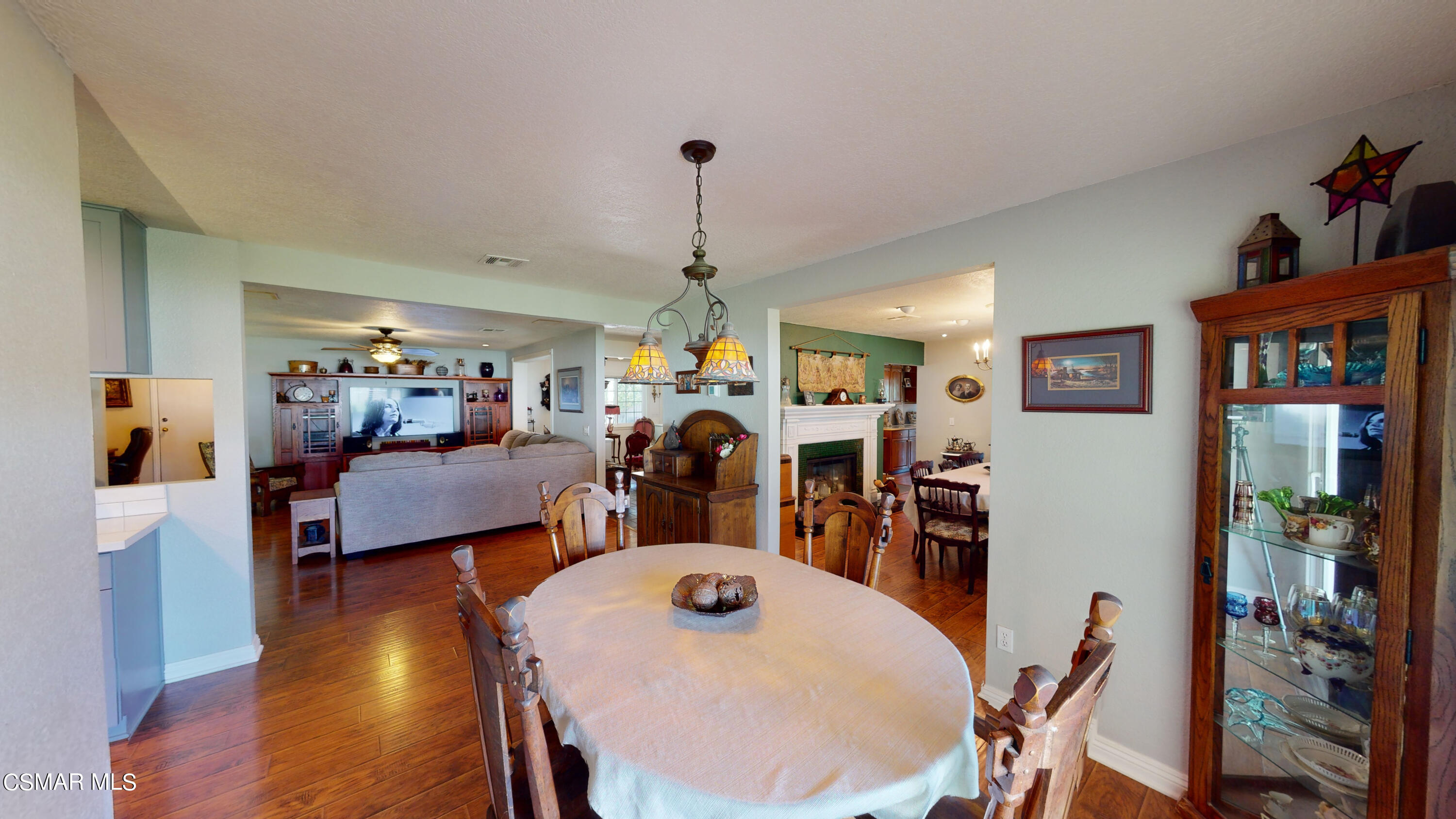 4865 Leeds Street Simi Valley, CA 93063 - Photo 11 of 91 a view of a dining room with furniture and wooden floor