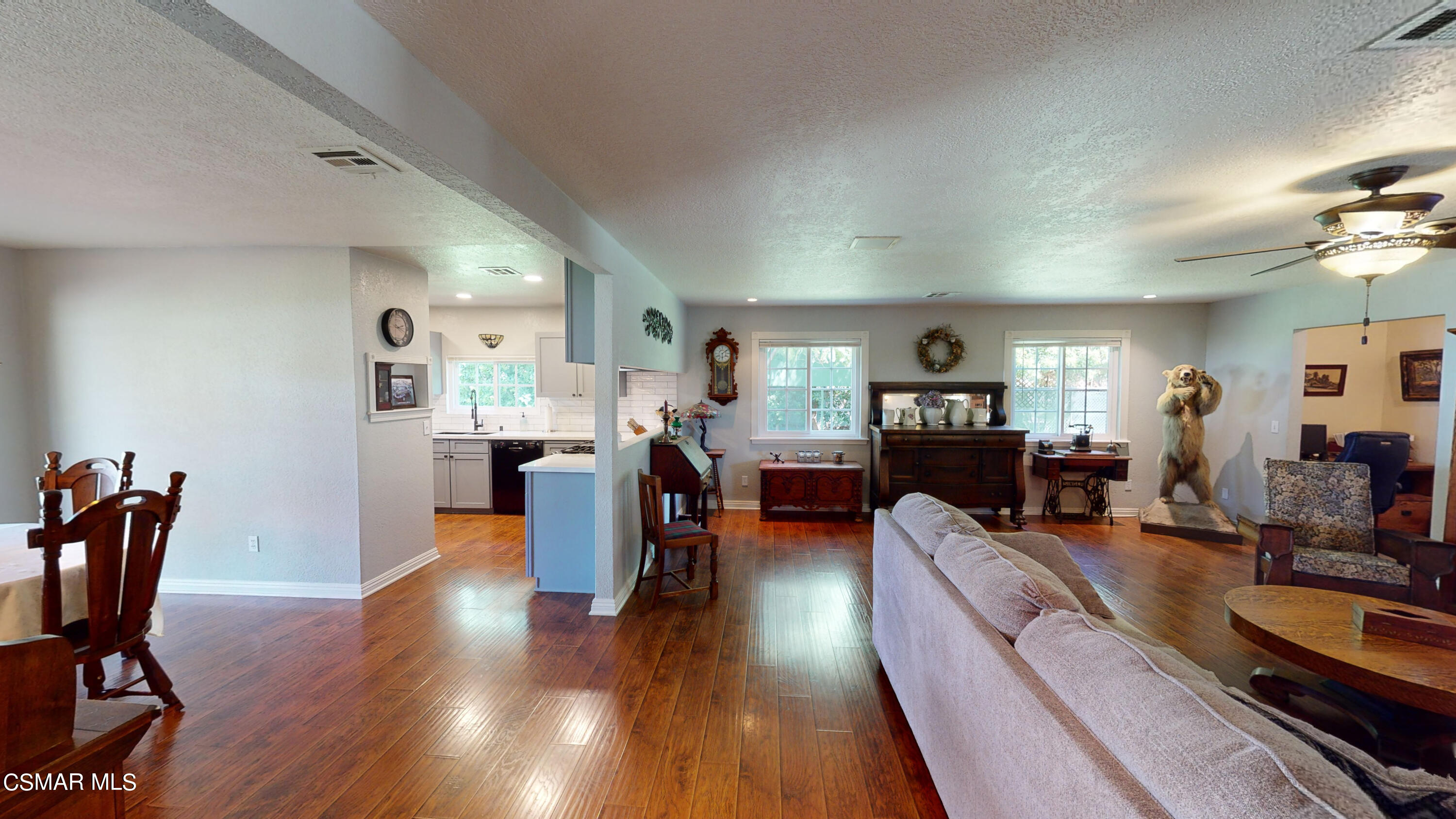 4865 Leeds Street Simi Valley, CA 93063 - Photo 12 of 91 a living room with furniture and a wooden floor