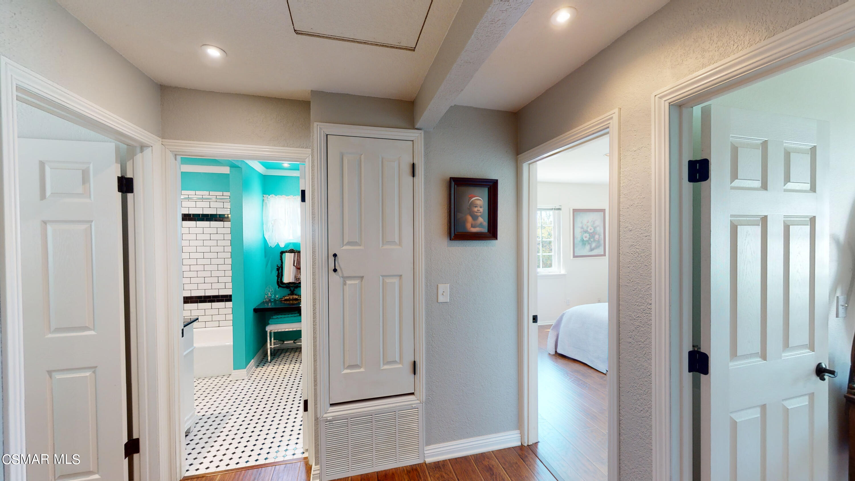 4865 Leeds Street Simi Valley, CA 93063 - Photo 25 of 91 a view of a hallway with wooden floor and staircase