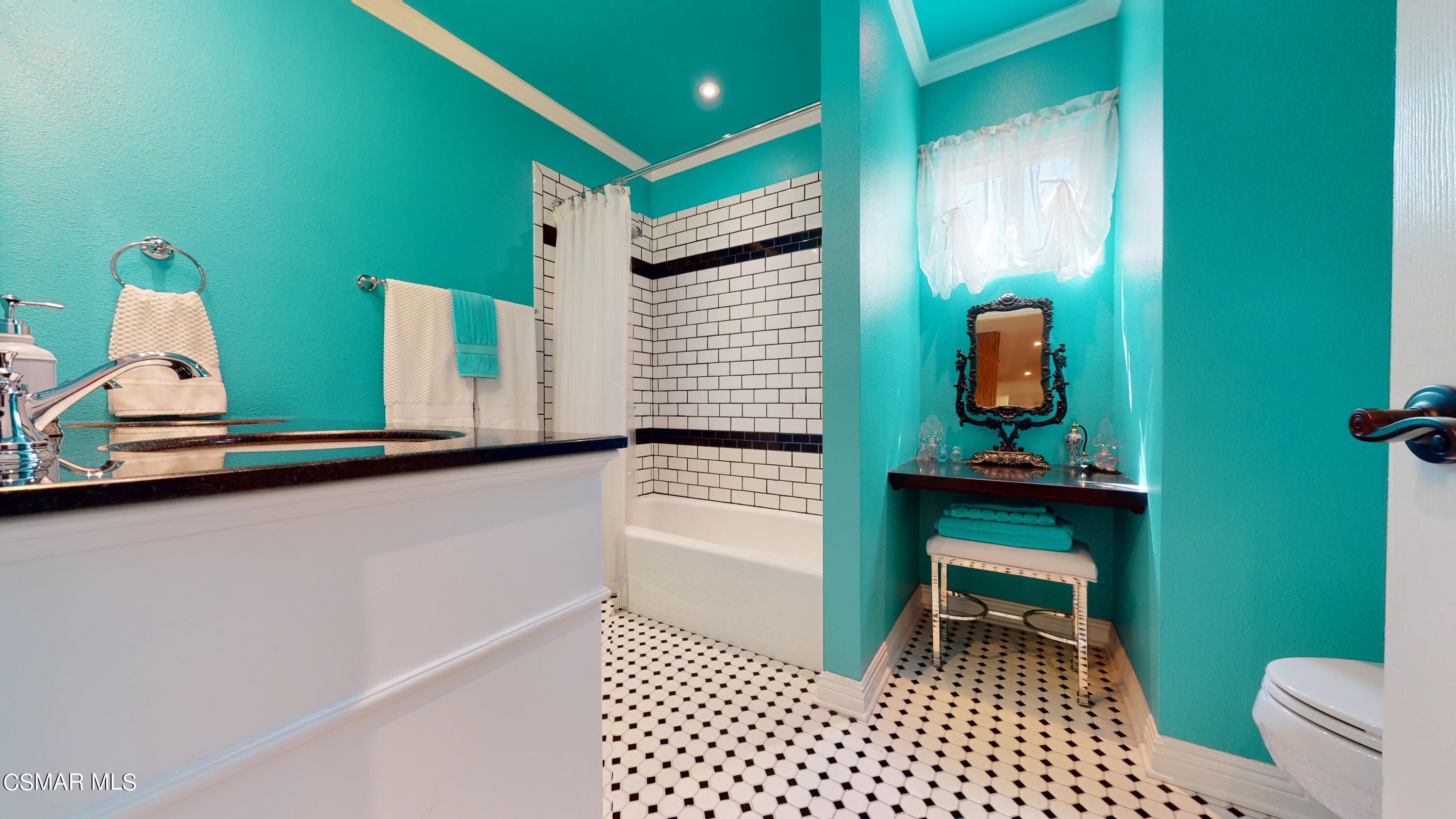 4865 Leeds Street Simi Valley, CA 93063 - Photo 31 of 91 a bathroom with a toilet and a sink