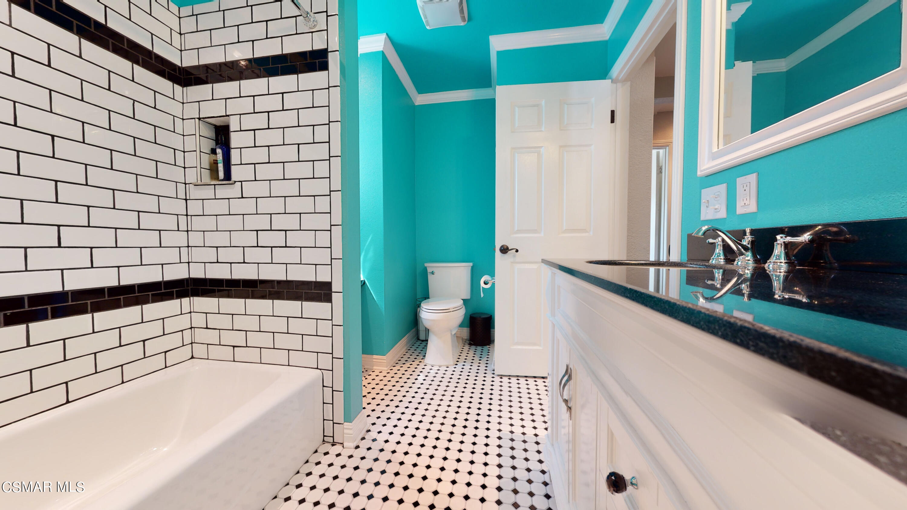 4865 Leeds Street Simi Valley, CA 93063 - Photo 32 of 91 a bathroom with a bathtub and a sink