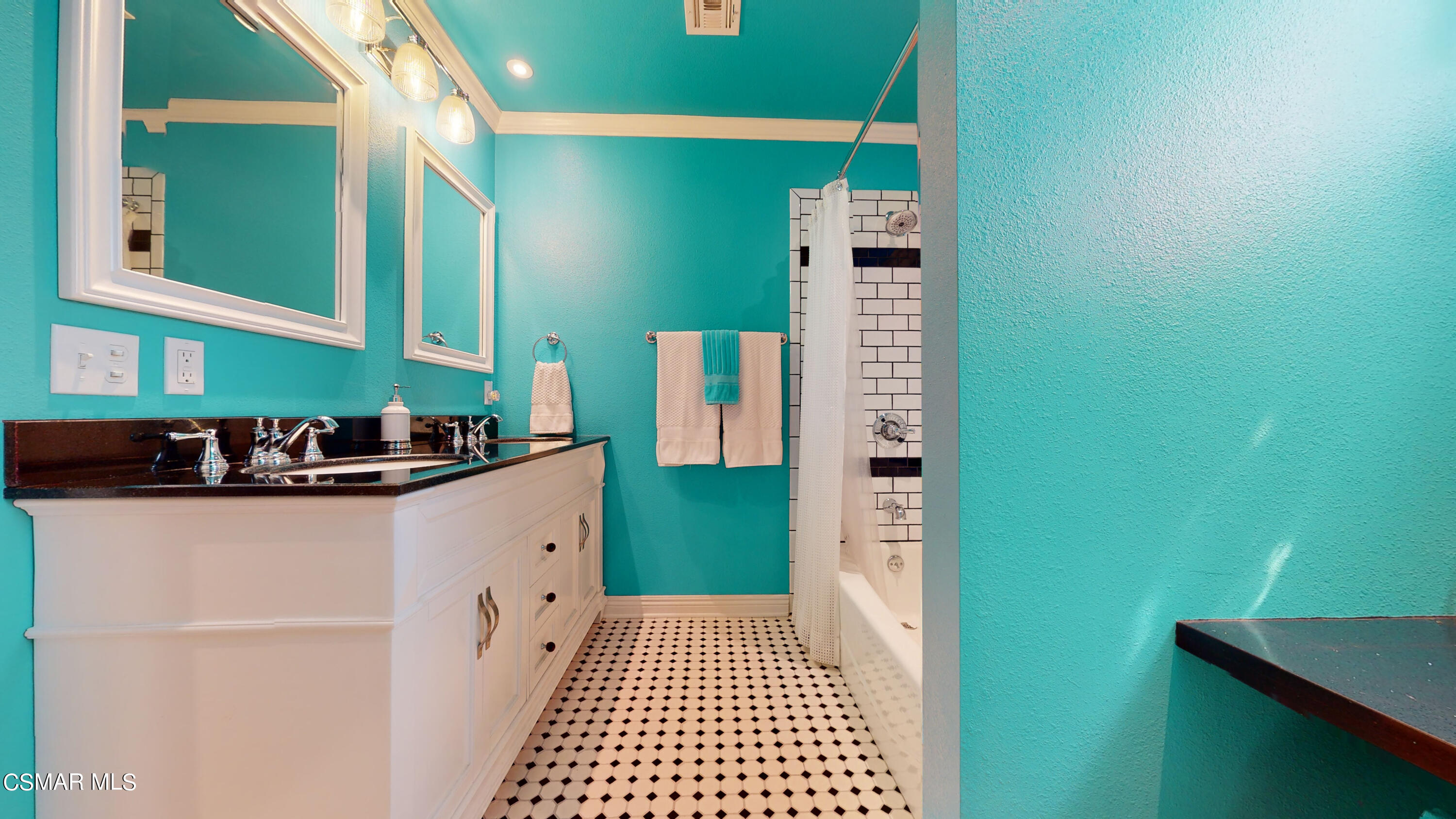 4865 Leeds Street Simi Valley, CA 93063 - Photo 33 of 91 a kitchen with a refrigerator and a sink