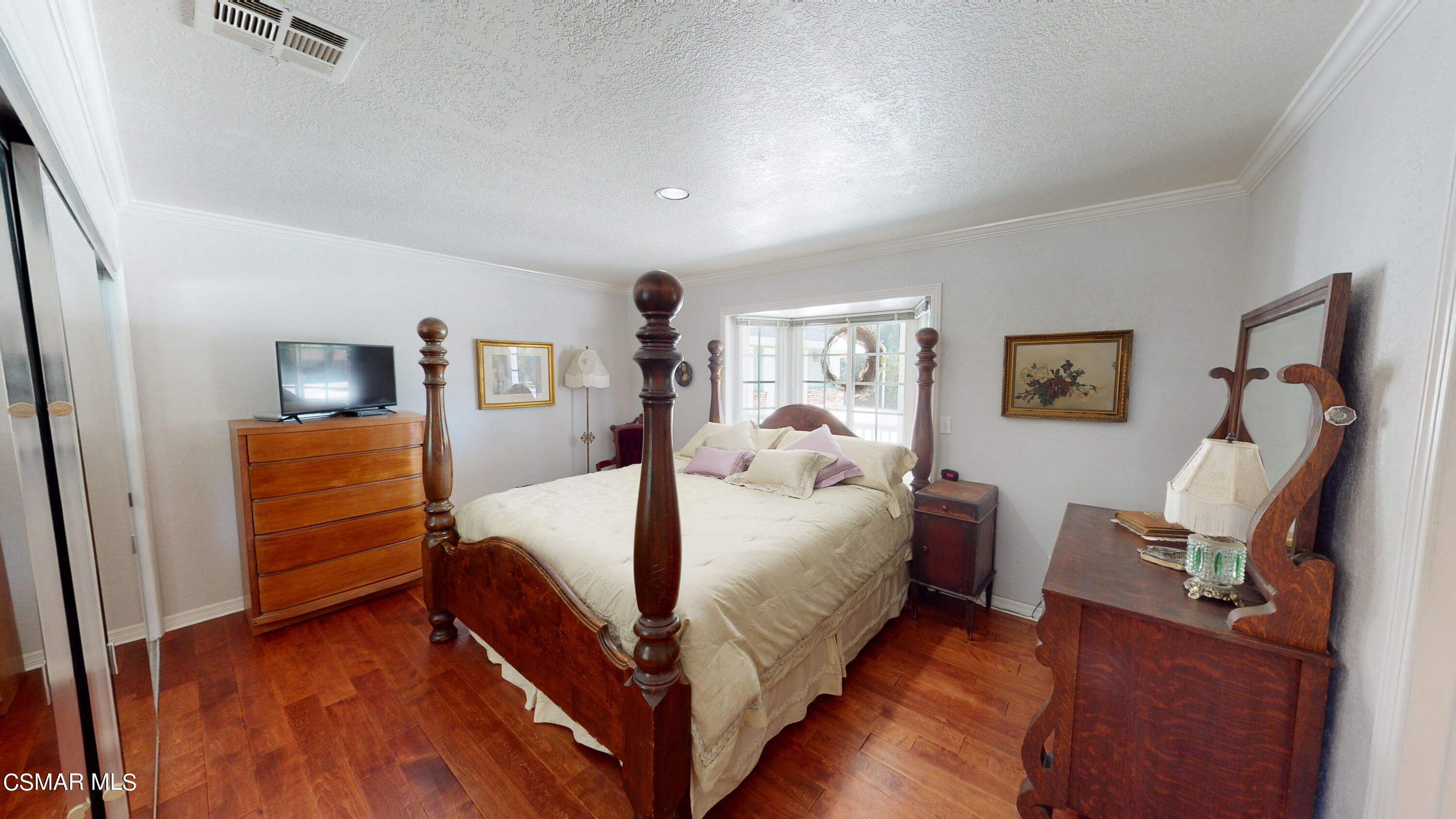 4865 Leeds Street Simi Valley, CA 93063 - Photo 34 of 91 a bed room with a bed and a tv