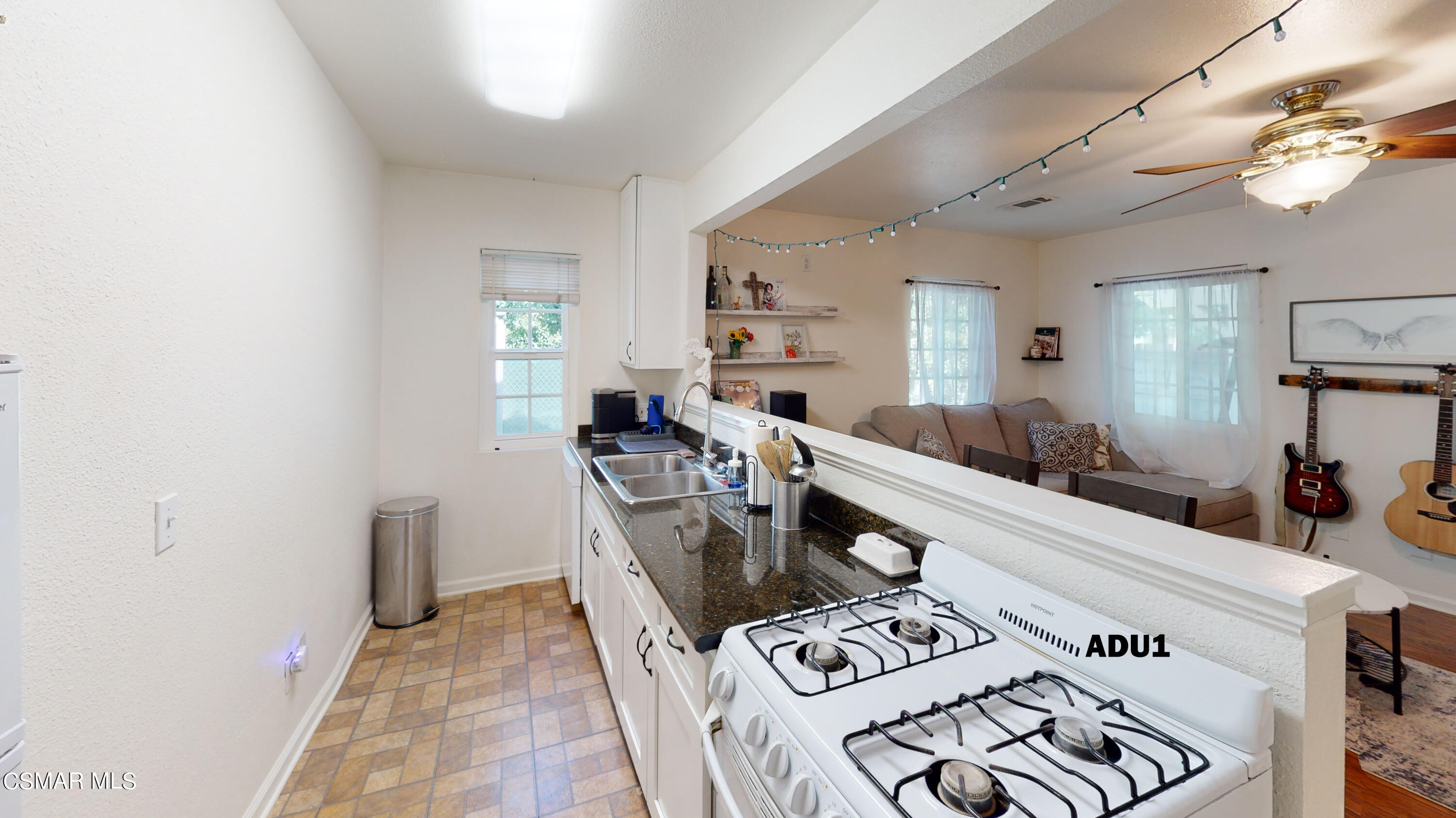 4865 Leeds Street Simi Valley, CA 93063 - Photo 47 of 91 a living room with furniture and a wooden floor