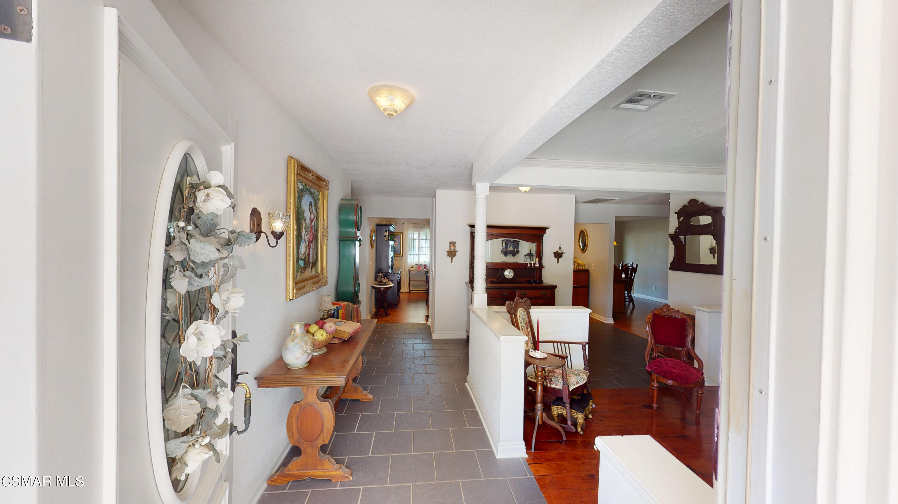 4865 Leeds Street Simi Valley, CA 93063 - Photo 5 of 91 a living room with furniture and wooden floor