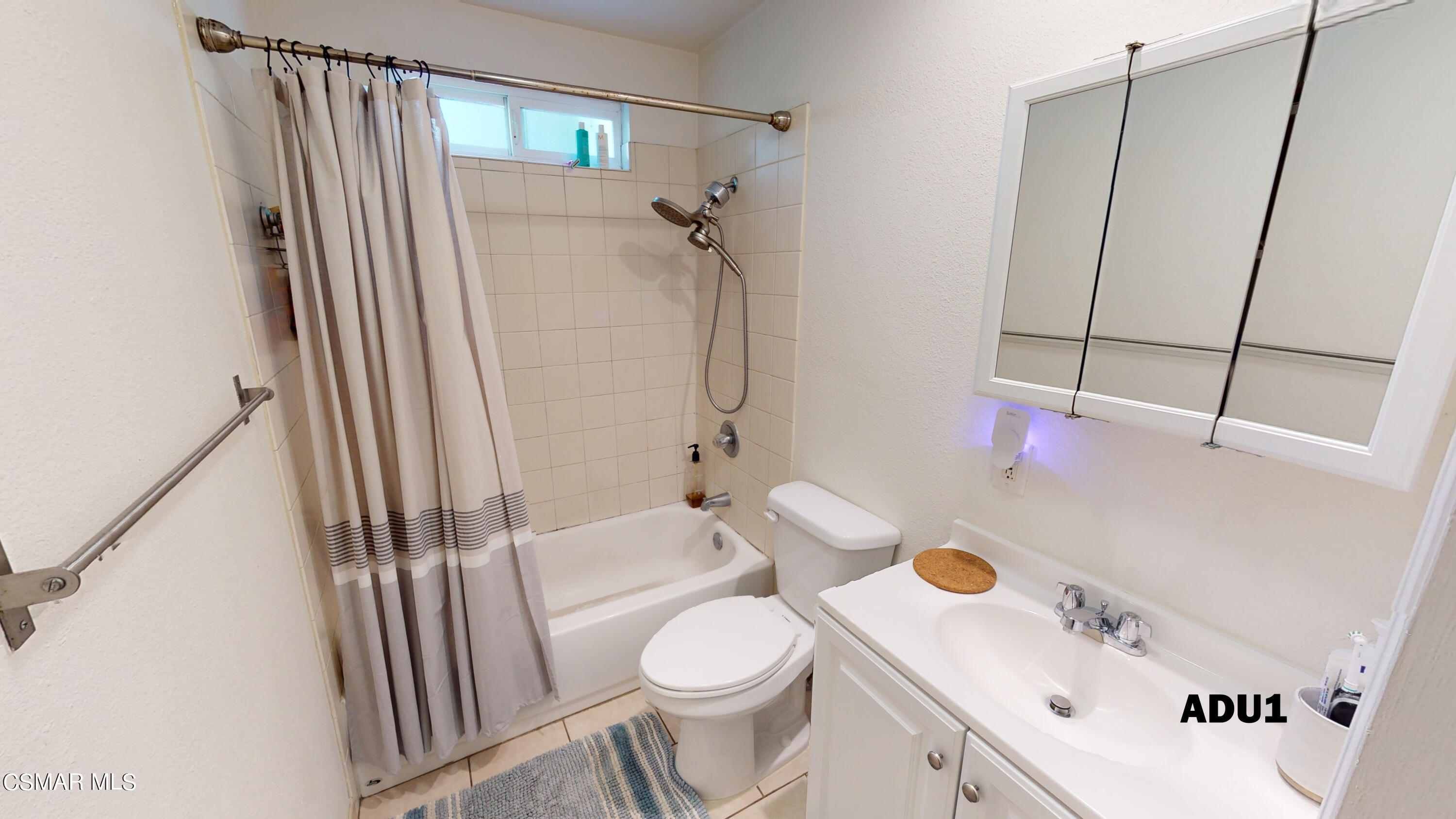 4865 Leeds Street Simi Valley, CA 93063 - Photo 52 of 91 a bathroom with a sink toilet and shower