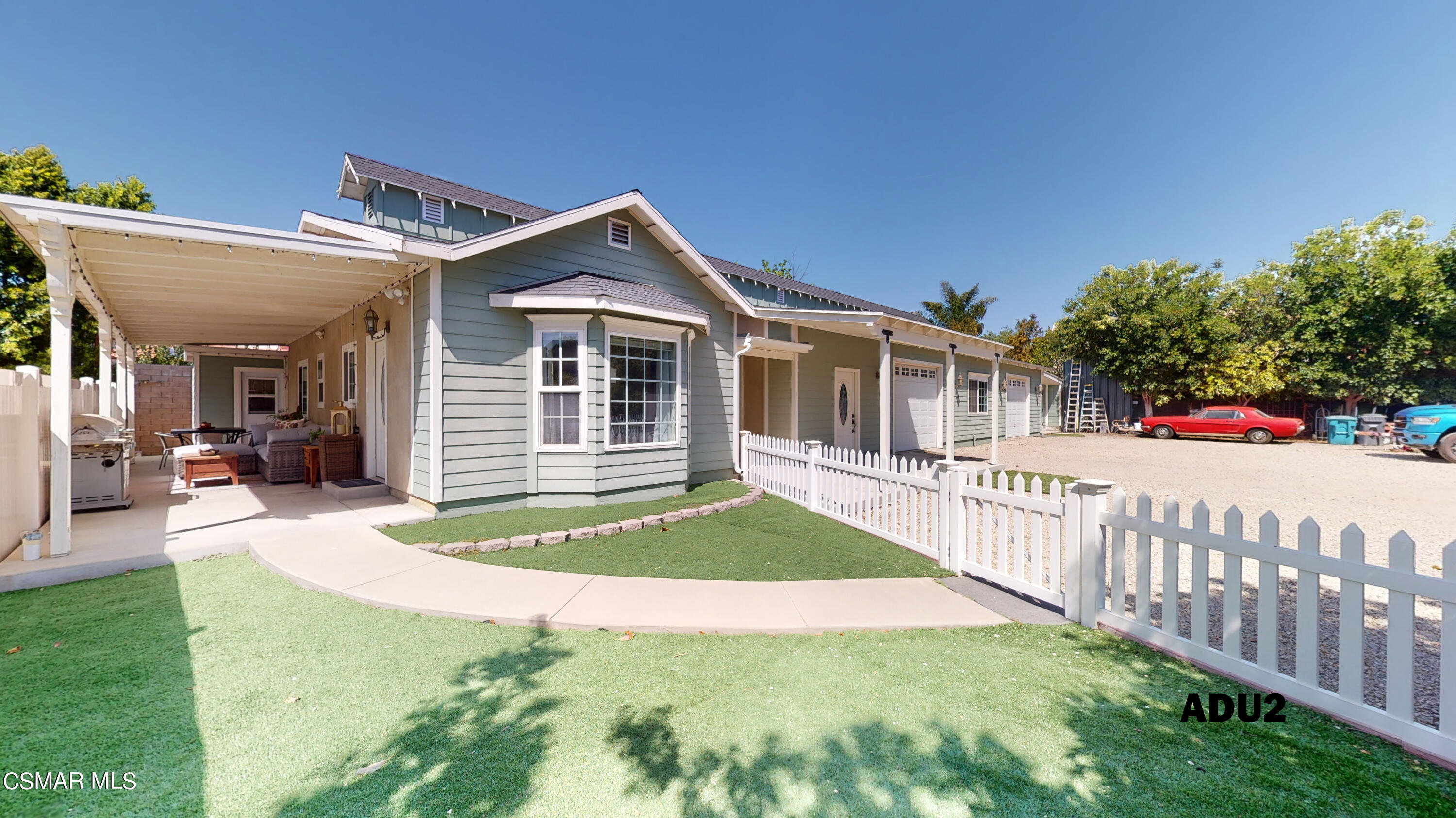 4865 Leeds Street Simi Valley, CA 93063 - Photo 55 of 91 a front view of a house with a yard