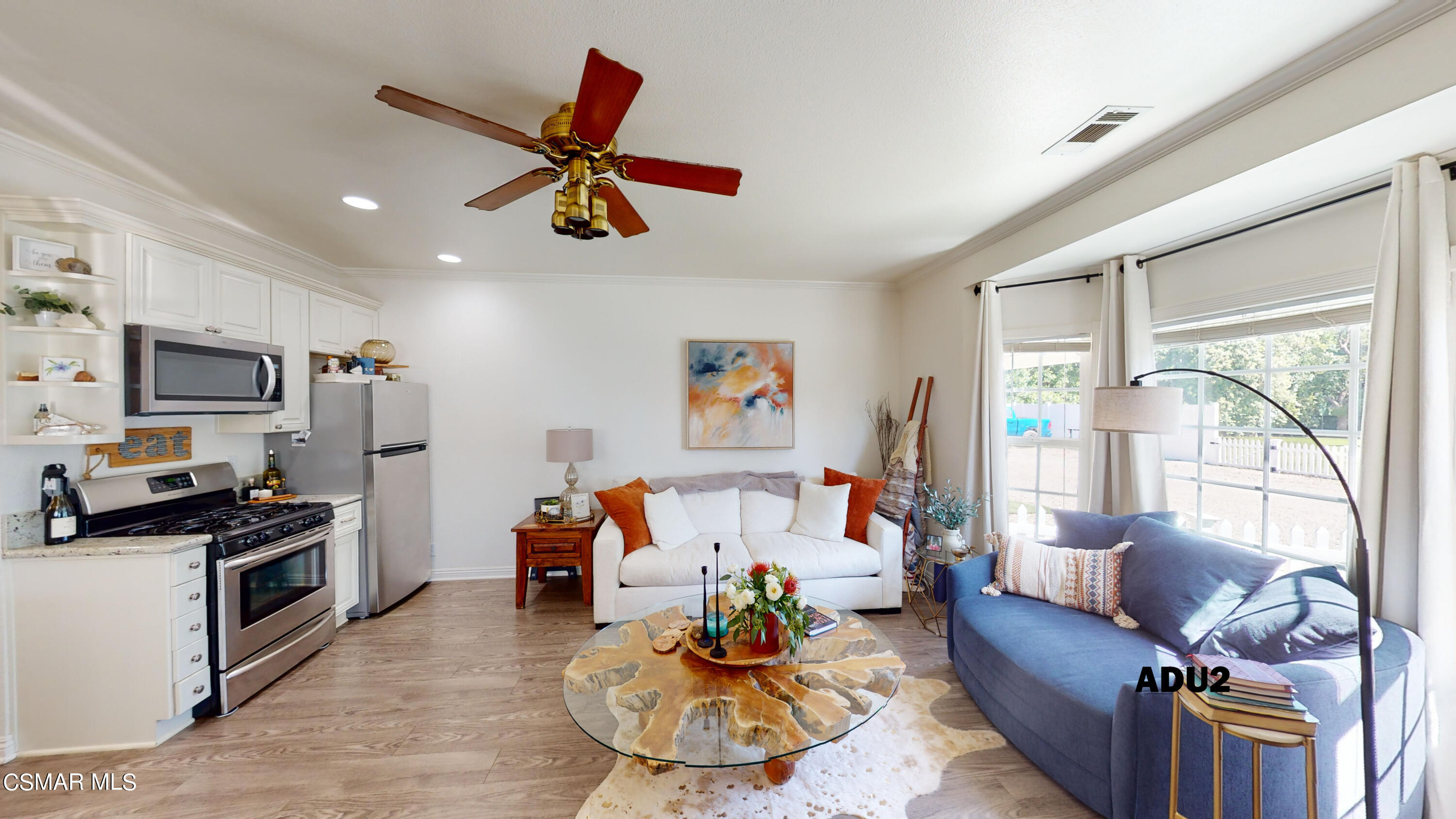 4865 Leeds Street Simi Valley, CA 93063 - Photo 59 of 91 a living room with furniture and a flat screen tv