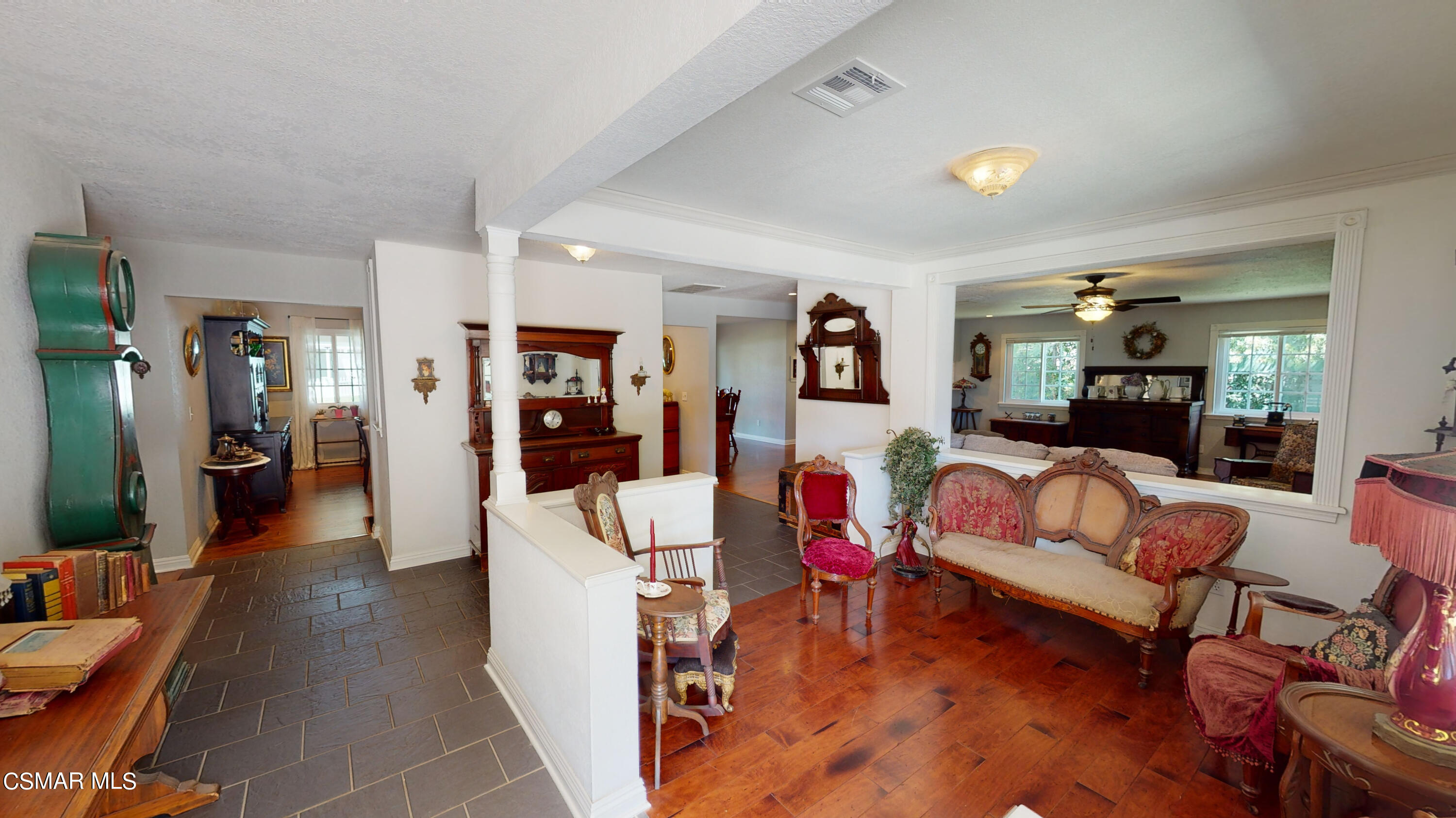 4865 Leeds Street Simi Valley, CA 93063 - Photo 6 of 91 a living room with furniture and a couch