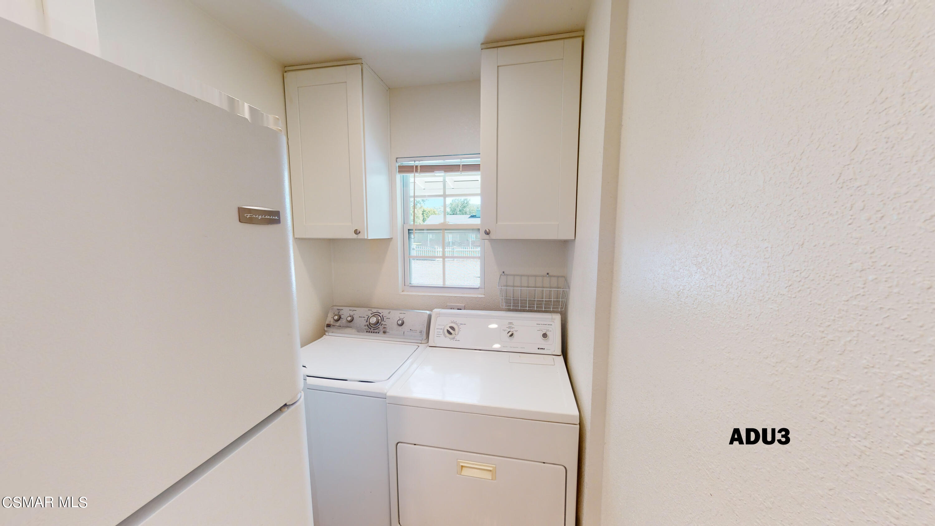 4865 Leeds Street Simi Valley, CA 93063 - Photo 73 of 91 a utility room with dryer and washer
