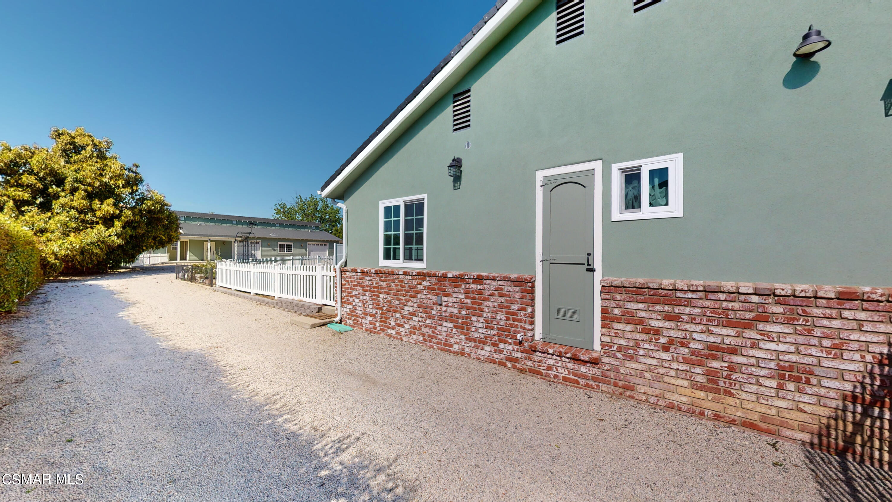 4865 Leeds Street Simi Valley, CA 93063 - Photo 84 of 91 a front view of a house with a yard