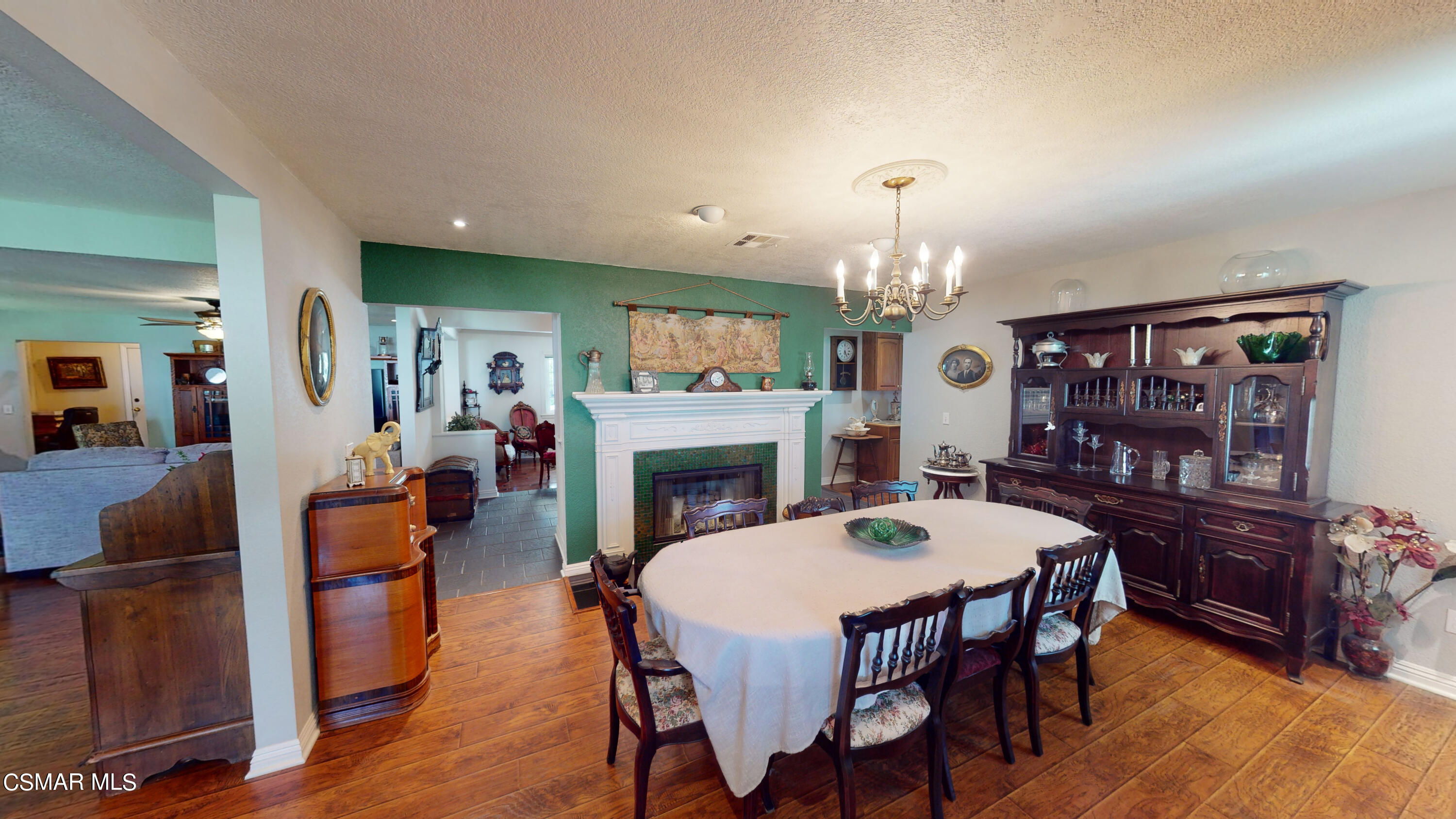 4865 Leeds Street Simi Valley, CA 93063 - Photo 9 of 91 a view of a dining room with furniture wooden floor and chandelier