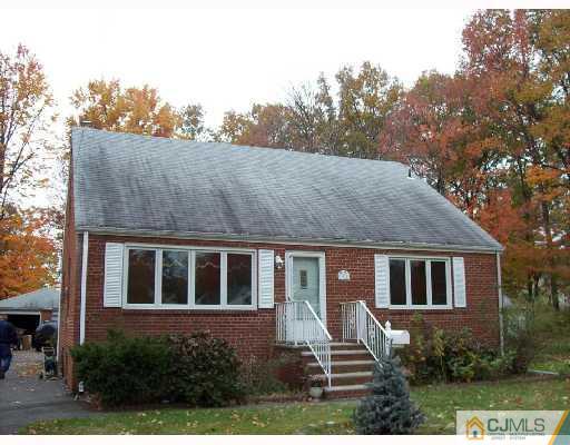 93 Highland Road Colonia, NJ 07067 - Photo 1 of 3 a house view with a garden space