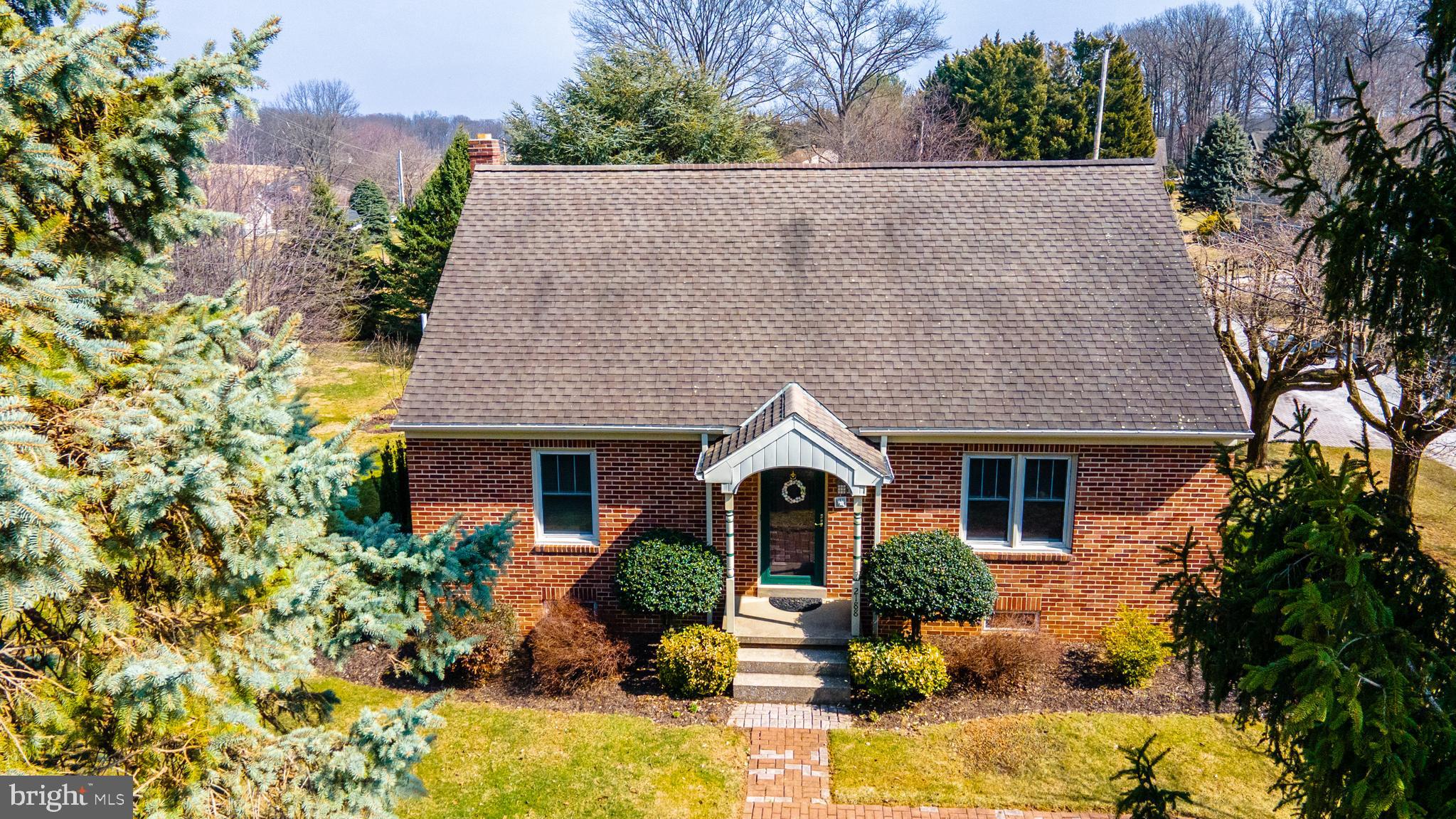 2188 Grandview Road Hanover, PA 17331 - Photo 1 of 37 a front view of a house with garden