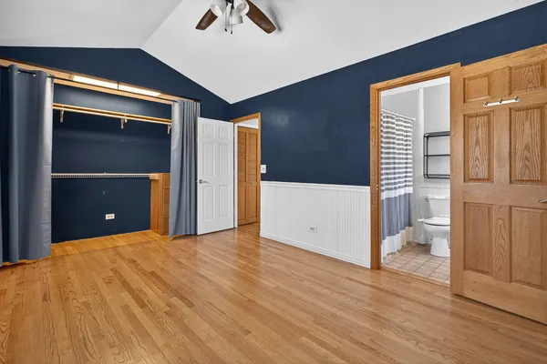 a bathroom with a toilet and a bathtub