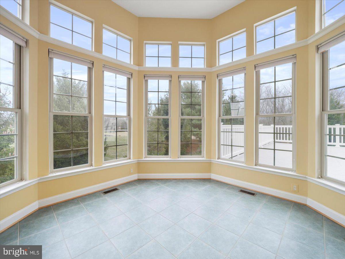2601 Mill Race Road Frederick, MD 21701 - Photo 15 of 82 a view of an empty room with a large window