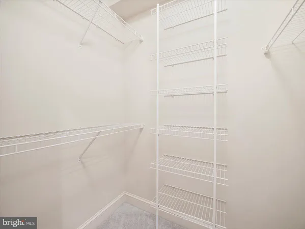 a bathroom with a bathtub a sink and a mirror