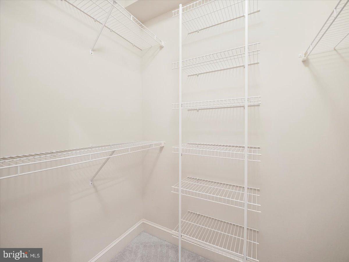 2601 Mill Race Road Frederick, MD 21701 - Photo 27 of 82 a view of a room with racks on the wall