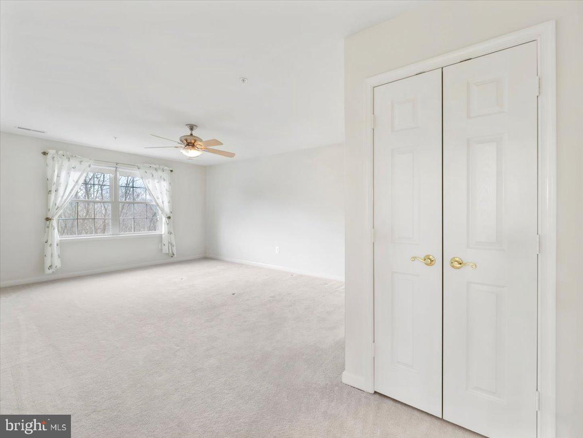 2601 Mill Race Road Frederick, MD 21701 - Photo 39 of 82 a view of an empty room with a window
