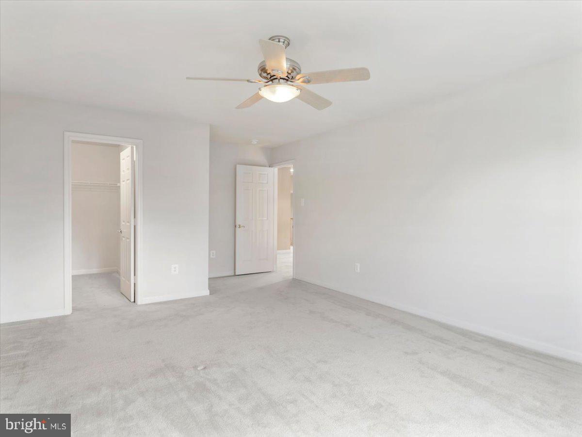 2601 Mill Race Road Frederick, MD 21701 - Photo 40 of 82 a view of an empty room with a ceiling fan