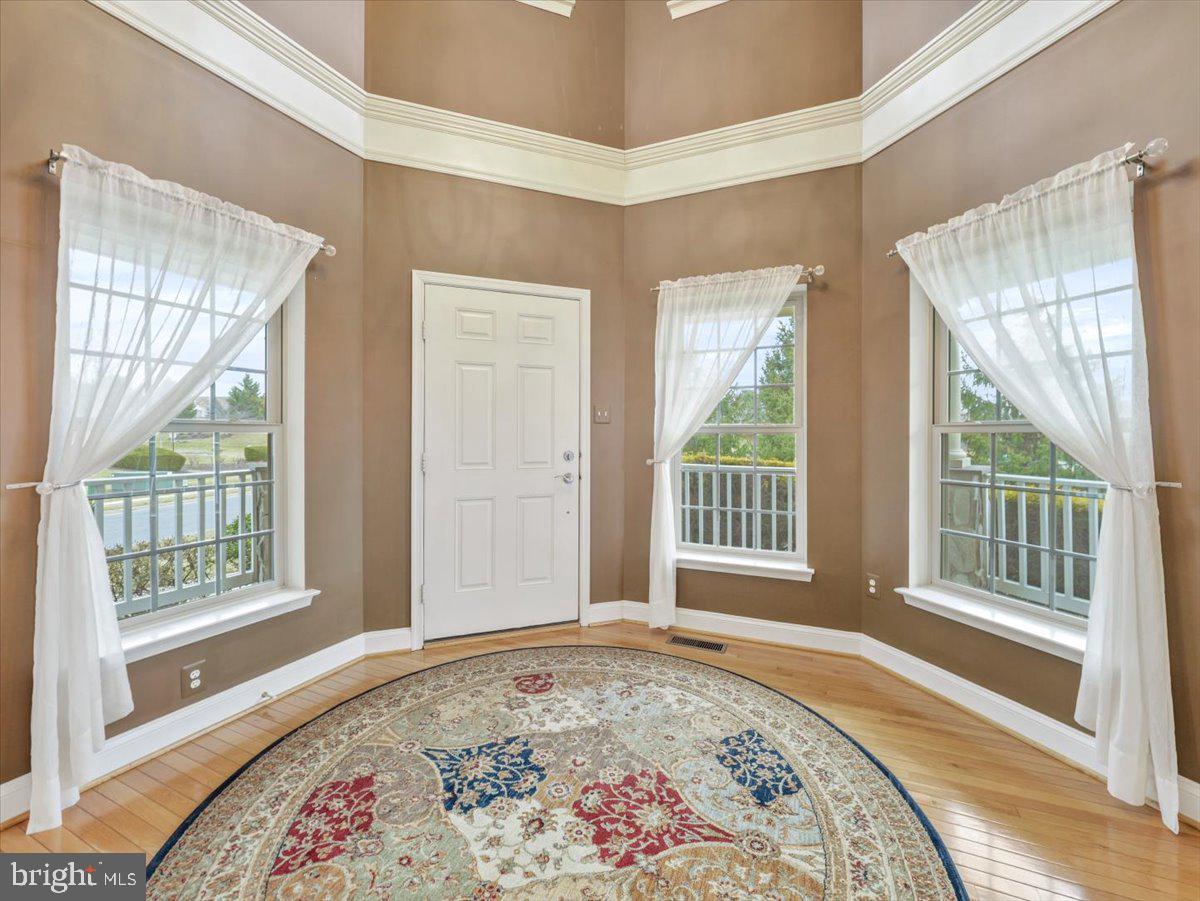 2601 Mill Race Road Frederick, MD 21701 - Photo 4 of 82 a view of a bedroom with wooden floor and a window