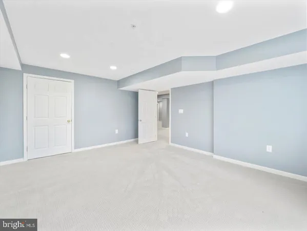 a view of a backyard with water fountain