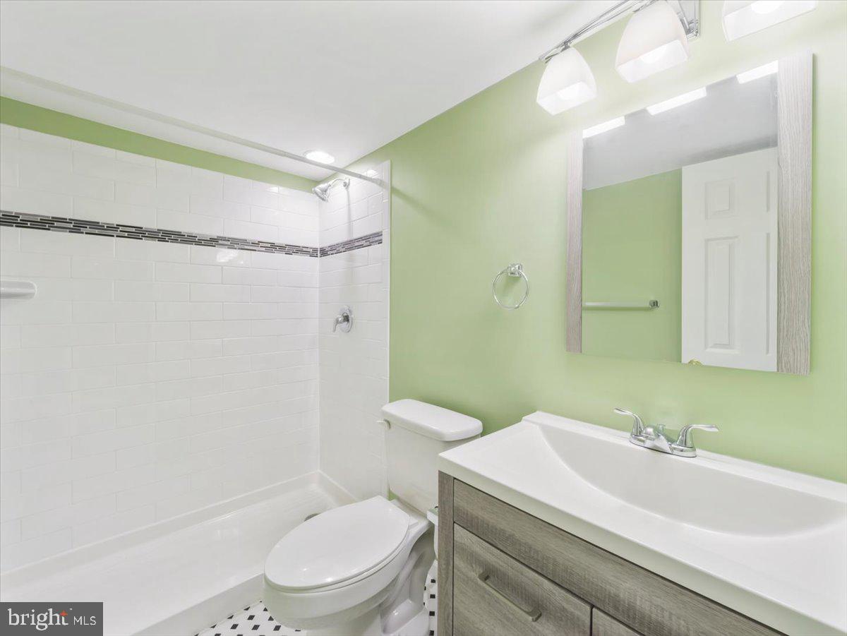 2601 Mill Race Road Frederick, MD 21701 - Photo 46 of 82 a bathroom with a sink a toilet and shower