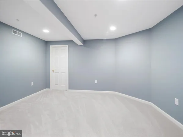 a view of a yard with a snow on the road