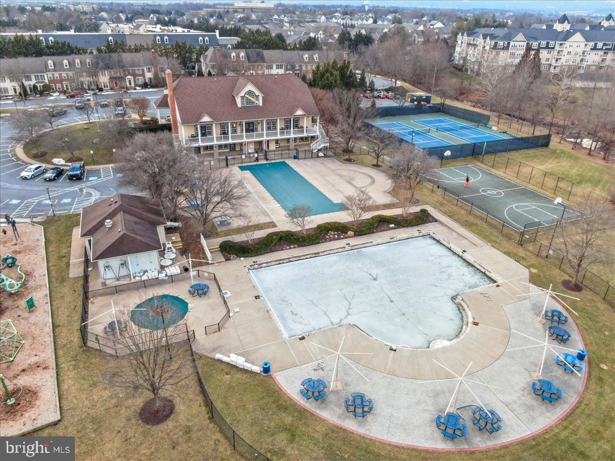 2601 Mill Race Road Frederick, MD 21701 - Photo 63 of 82 a view of a swimming pool with outdoor seating