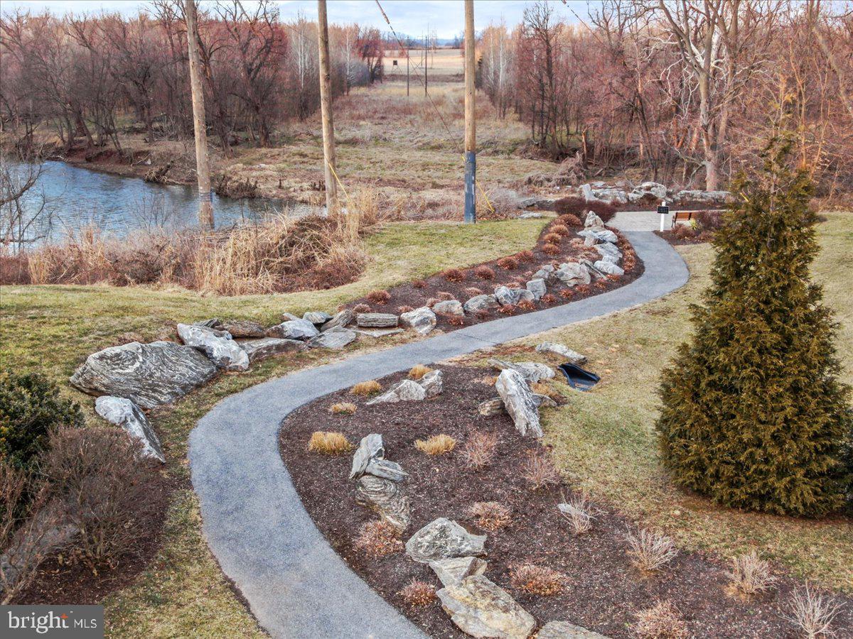 2601 Mill Race Road Frederick, MD 21701 - Photo 73 of 82 a view of a backyard with water fountain