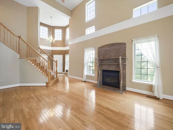 a view of an empty room with a large window