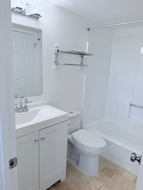 2500 Burleson Road, Unit 713 Austin, TX 78741 - Photo 7 of 15 A well-maintained bathroom with a sleek vanity and a pristine tub.