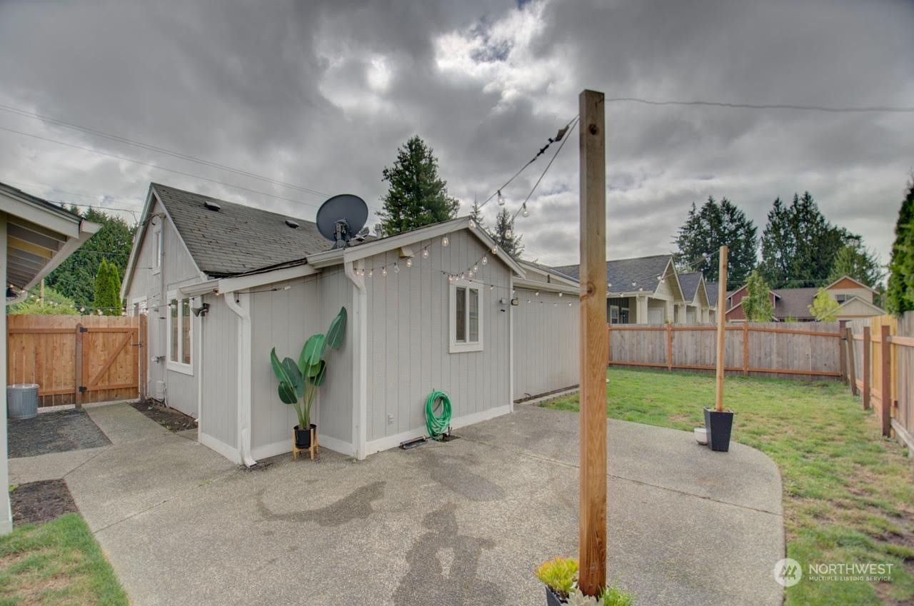 1321 Golf Club Road Southeast Lacey, WA 98503 - Photo 24 of 25 a front view of a house with garden