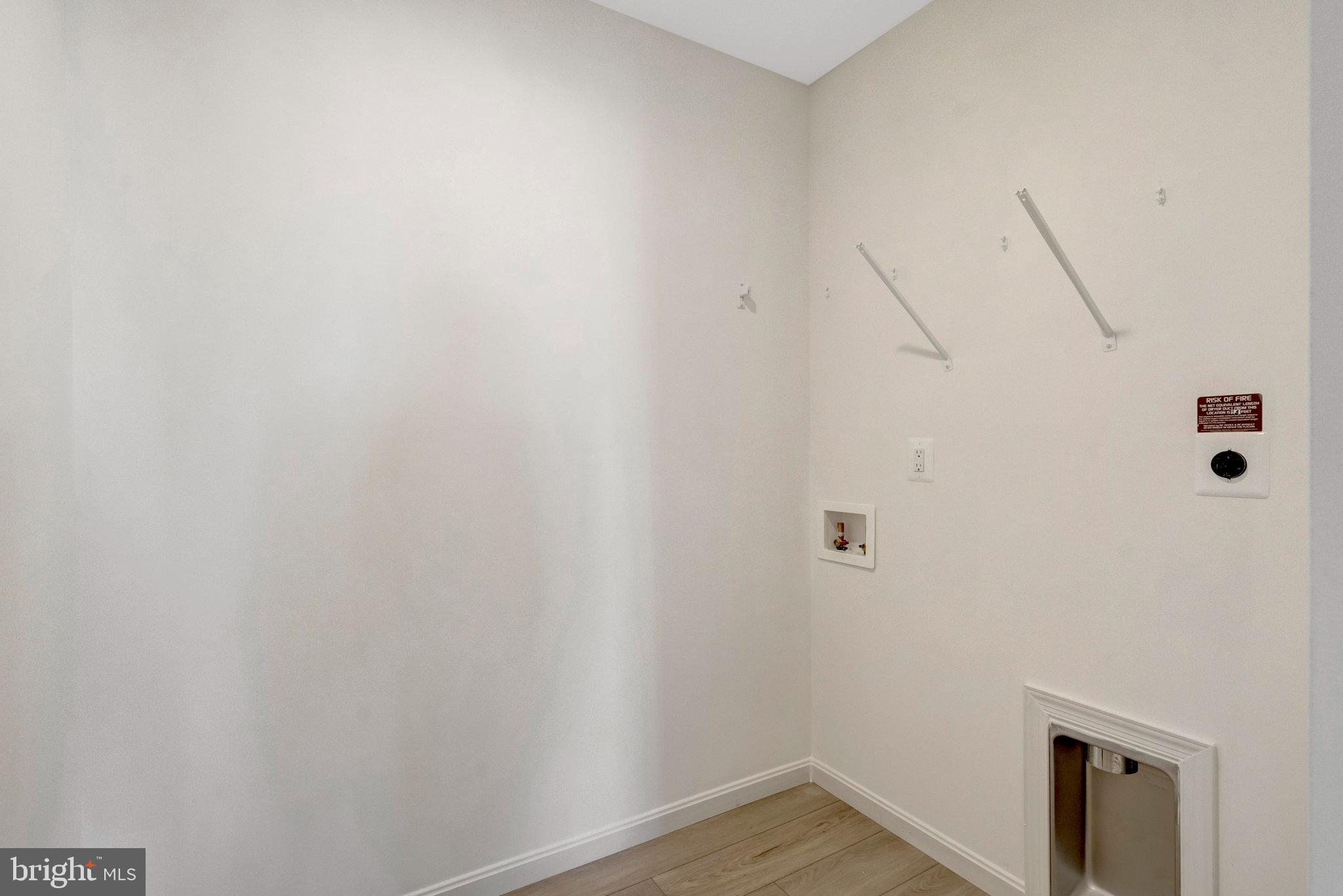 1925 Sunset Lane Culpeper, VA 22701 - Photo 43 of 74 a view of a room with racks on the wall