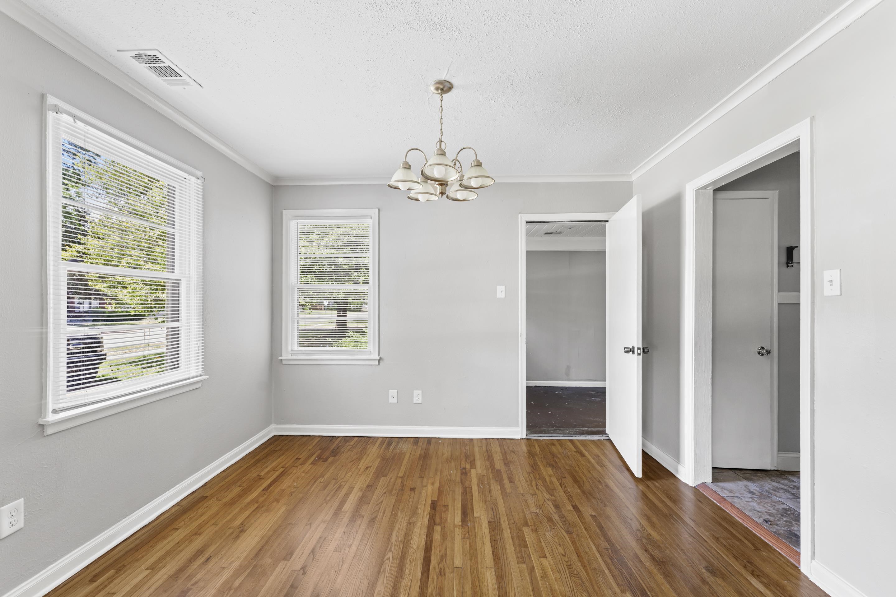 1418 South Perkins Road Memphis, TN 38117 - Photo 4 of 21 a view of livingroom with hardwood floor and window