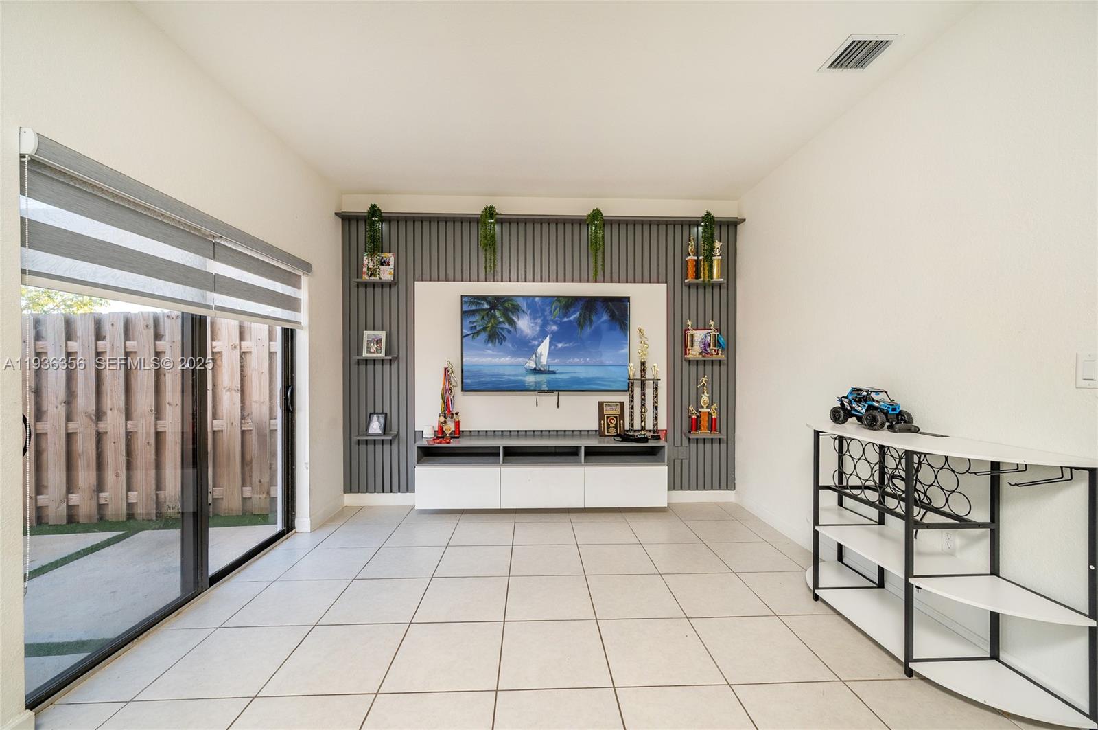 23061 Southwest 128th Place Miami, FL 33177 - Photo 11 of 28 a view of an empty room and window