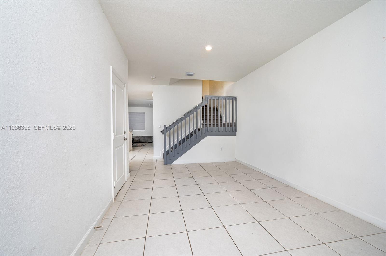 23061 Southwest 128th Place Miami, FL 33177 - Photo 2 of 28 a view of an empty room