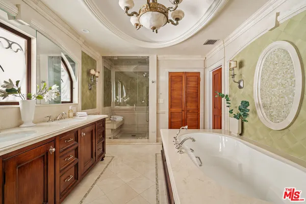 a view of a chairs and table in the patio