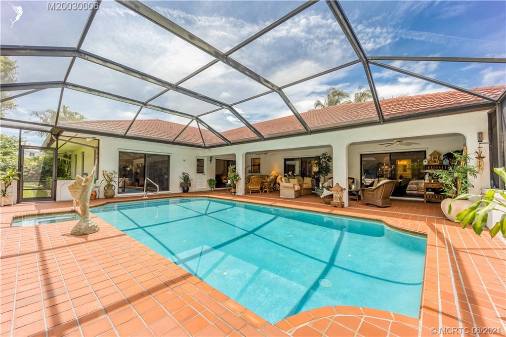 44 Rio Vista Drive Stuart, FL 34996 - Photo 3 of 36 Fabulous Pool / Spa and ultra- spacious Lanai for true outdoor living!