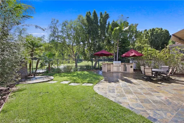 a view of a backyard with a patio