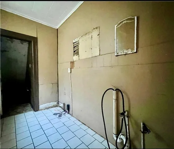 a room with a table and chairs