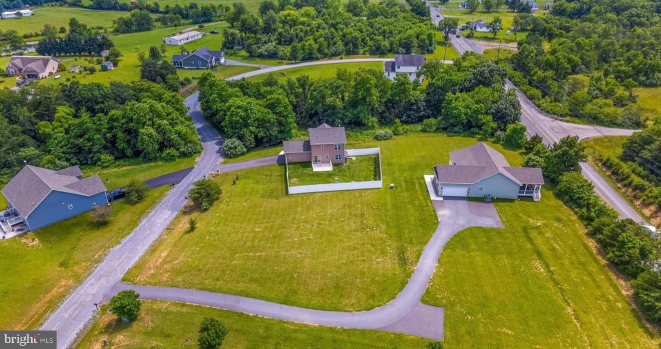 123 Hank Aaron Road Berkeley Springs, WV 25411 - Photo 5 of 32 Serene suburban landscape awaits.