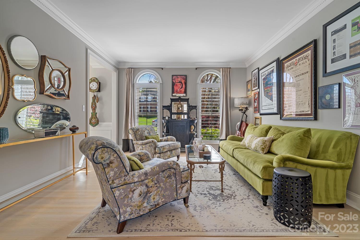 4612 Binfords Ridge Road Charlotte, NC 28226 - Photo 11 of 48 a living room with furniture and floor to ceiling window
