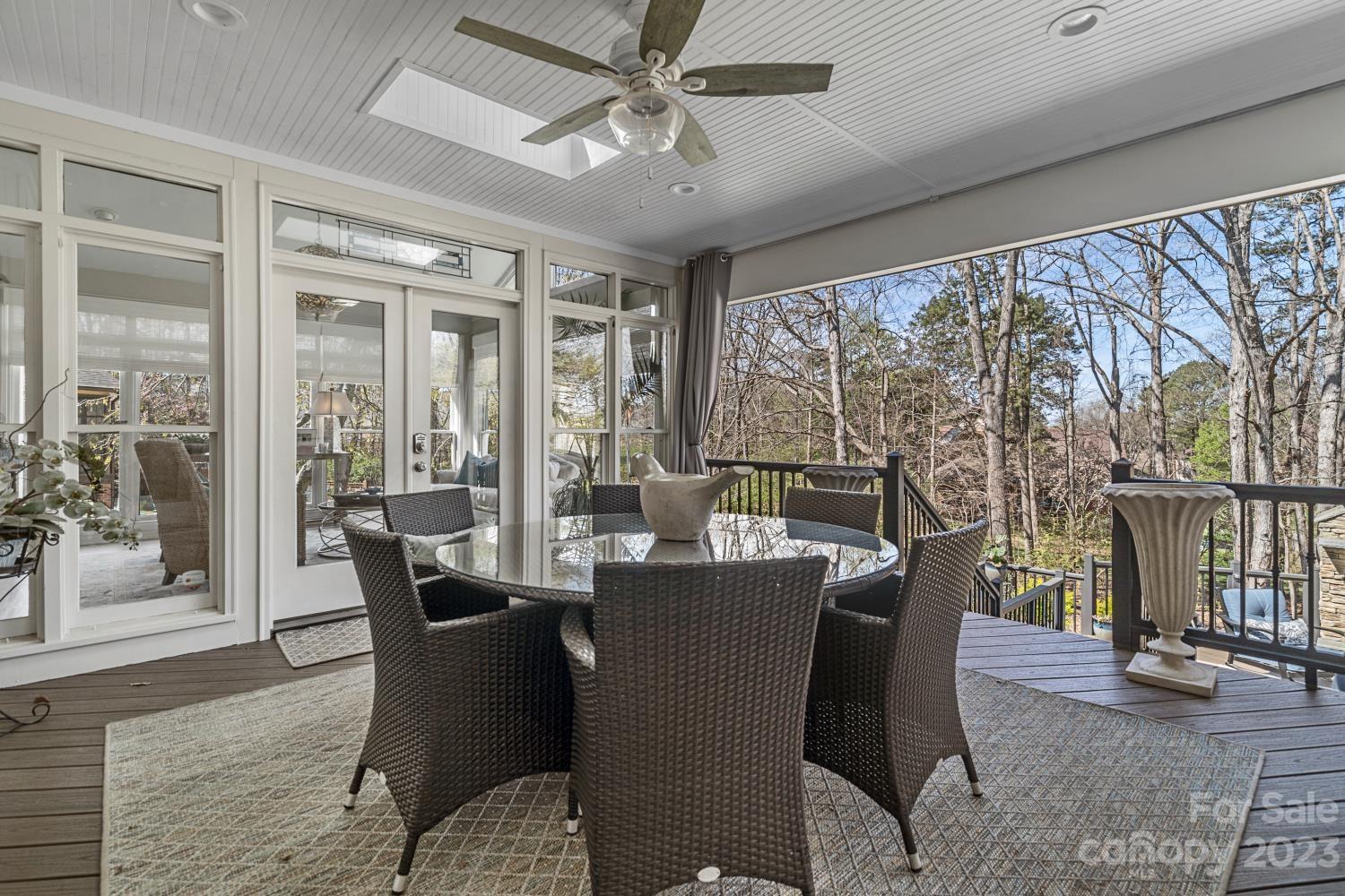 4612 Binfords Ridge Road Charlotte, NC 28226 - Photo 15 of 48 a view of a dining room with furniture window and outside view