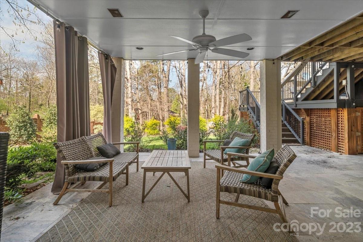 4612 Binfords Ridge Road Charlotte, NC 28226 - Photo 34 of 48 a living room with furniture and a large window