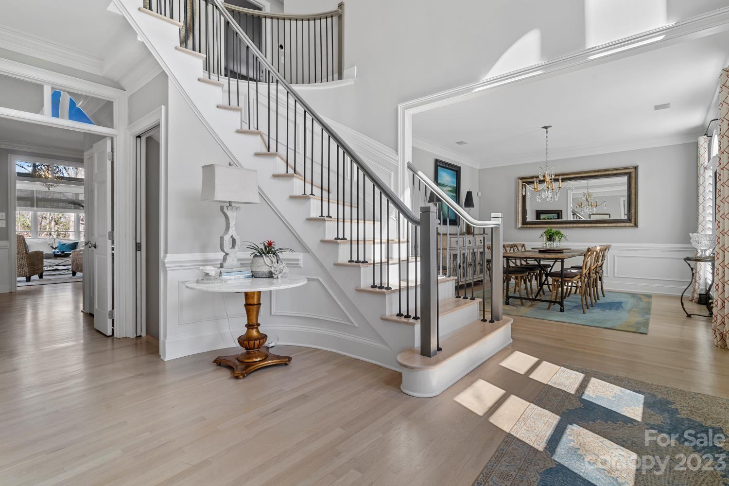 4612 Binfords Ridge Road Charlotte, NC 28226 - Photo 4 of 48 a view of entryway and hall with dining room