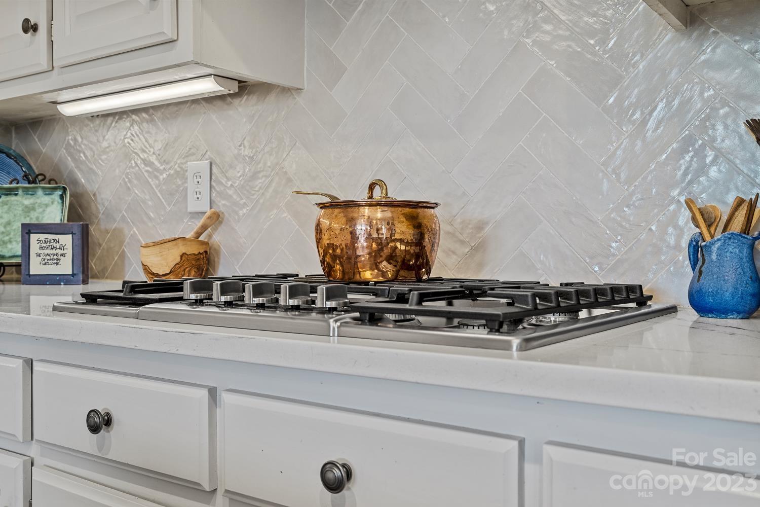 4612 Binfords Ridge Road Charlotte, NC 28226 - Photo 44 of 48 a stove top oven sitting inside of a kitchen