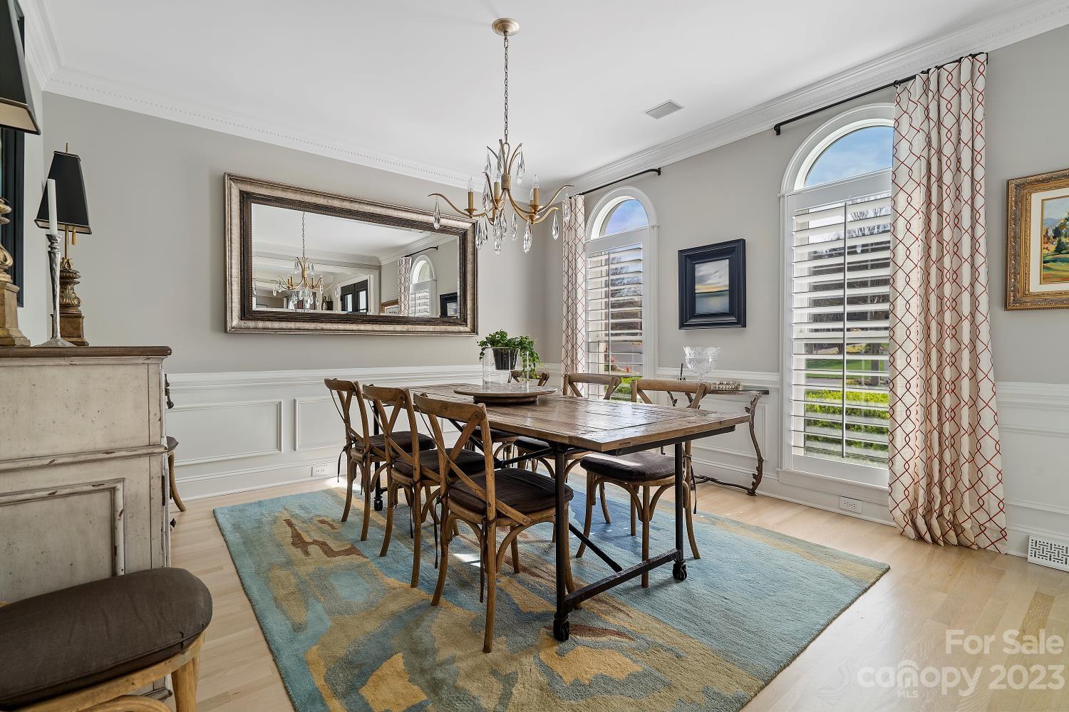 4612 Binfords Ridge Road Charlotte, NC 28226 - Photo 5 of 48 a view of a dining room with furniture window and wooden floor