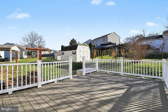 a view of a wrought iron fences in front of house