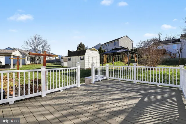 a view of a wrought iron fences in front of house